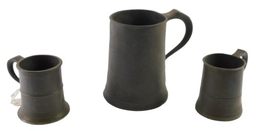 Victorian pewter tankards or measure, including a one quart measure, and two half pint measures, two with stamped marks for Yates & Birch.