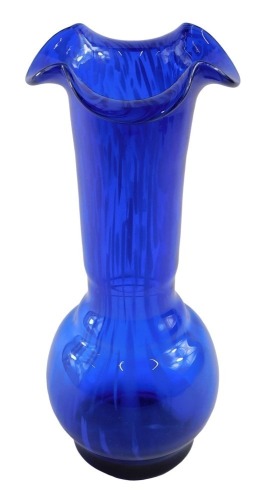 A late Victorian blue mottled glass vase, with everted crimped border, and slender tapered body, with globe base, pontil mark to the foot, 35cm high.