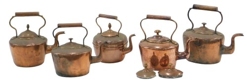 Five copper kettles.