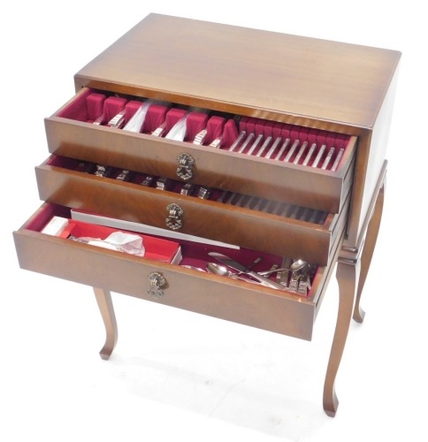 A canteen of community plate cutlery and flatware, for twelve place settings, including dinner knives and forks, dessert knives, spoons and forks, soup spoons, fish knives and forks, and some additional assorted pieces, including a three piece carving set