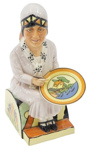 Francis pottery figure of Clarice Cliff, modelled by Douglas V Tootle, in a seated pose, limited edition 34/350, for Harrods, 22 cm high.