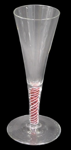 An 18thC style glass, with plain conical tapered bowl and air twist stem.