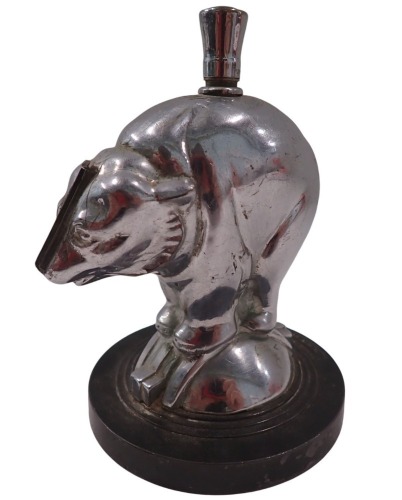 An Art Metal Works 1930s/40s table lighter, formed as a bear, in chrome finish on blackened circular base, 12cm high, 9cm diameter.