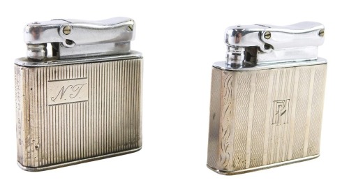 Two Colibre Monopol Empire pocket lighters, each white metal with lion pattern stamp.