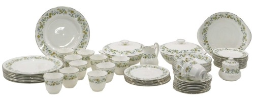 A Royal Doulton Ainsdale pattern part tea and dinner service, comprising two tureens and covers, cake plate, milk jug, sugar bowl, twelve teacups and saucers, eight dinner plates, eight bowls. (a quantity)