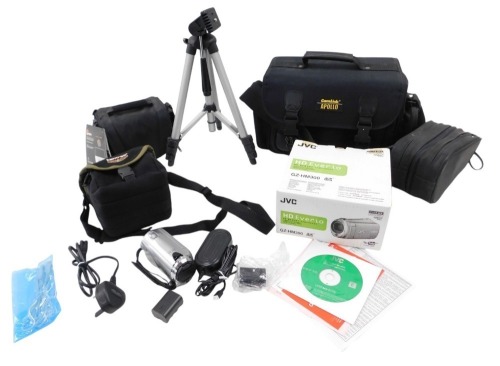 A group of camera equipment bags, to include CamLink Apollo, LowePro, empty JVC box, Tamrac tripod, and others. (1 tray)