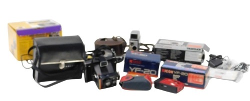 A group of camera and equipment, comprising a Rico YF20, boxed, a Traveller DC-XZ6, boxed, a Bell & Howell Auto Set 624EE, a Kodak DC220, boxed, and a Polaroid Supercolour Swinger II. (1 tray)