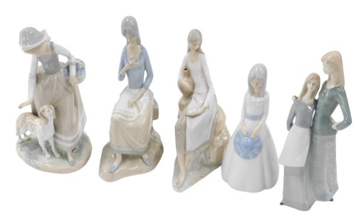 Five Spanish porcelain figures, comprising two Nao figures, one of lady with basket and dog, 28cm high, and another of female reclined with water vessel, 27cm high, and three Spanish porcelain figures. (5)