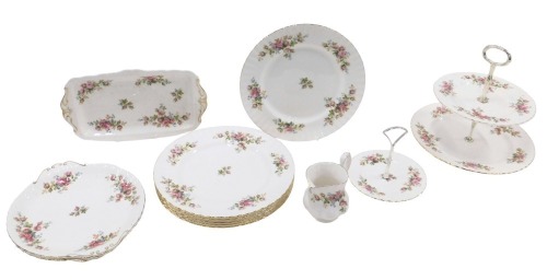 A Royal Albert Moss Rose pattern part dinner service, comprising single cake stand, two tier cake stand, two serving plates, rectangular serving plate, milk jug, and six large dinner plates.