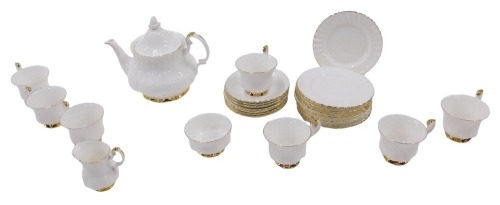 A Royal Albert Val D'or pattern part tea service, comprising teapot, milk jug, sugar bowl, seven tea cups and saucers, and twelve side plates.