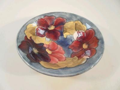 A Moorcroft circular bowl with everted border and decorated with lilies