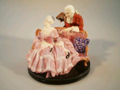 A Royal Doulton figure group 'Tete-a-Tete'