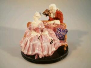 A Royal Doulton figure group 'Tete-a-Tete'