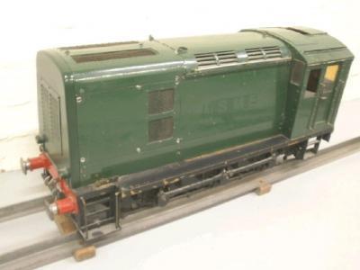 A 5" gauge garden railway kit built electric shunter in green livery