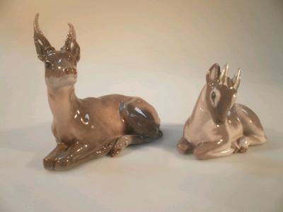 A Royal Copenhagen porcelain figure of a recumbent deer