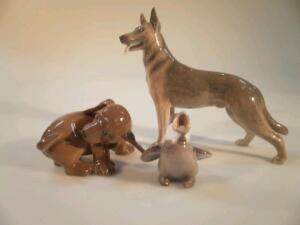 A Royal Copenhagen porcelain model of a German shepherd dog in a standing pose