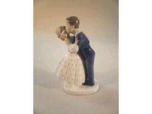 A Bing and Grondahl porcelain figure group of a group of two embracing figures