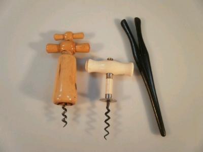 An antique ivory corkscrew