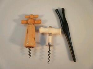 An antique ivory corkscrew