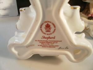 A pair of Royal Crown Derby figures of a shepherd and shepherdess - 2