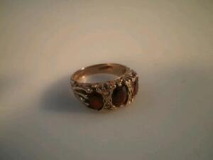 A garnet and diamond 9ct gold ring