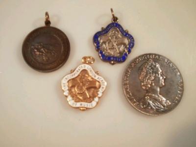 Two silver pendants, The Incorporated London Academy of Music in blue and