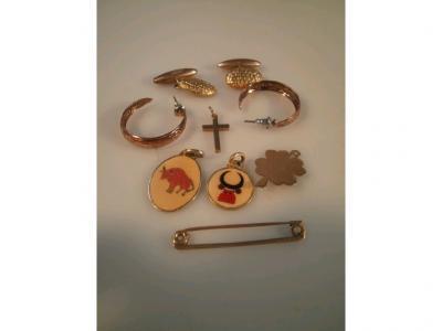 Two enamelled 18ct gold pendants