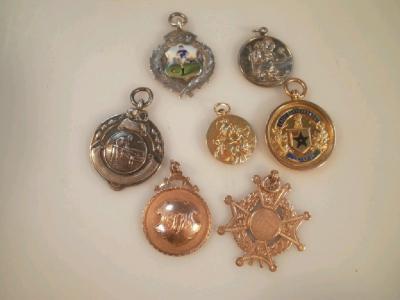 Three 9ct gold medallions