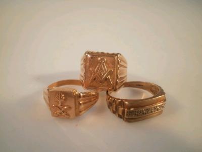 Three yellow metal gentleman's signet rings