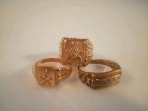 Three yellow metal gentleman's signet rings