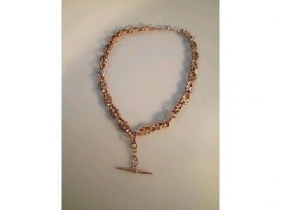 A 9ct rose gold fancy link Albert