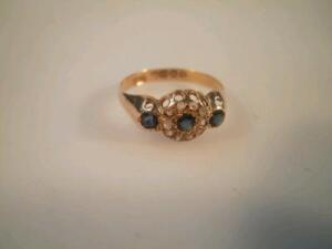 A sapphire and diamond cluster ring