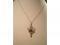 A 9ct Art Nouveau pendant set with an amethyst and thin necklet