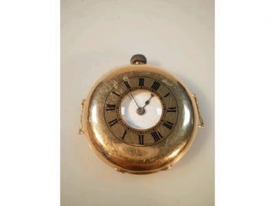 An 18ct gold half hunter wristwatch signed Stradling & Son
