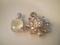 A 9ct gold and tiny diamond set sunflower pendant