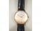 A man's Limit 14K gold dress wristwatch on leather strap