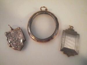 A glass faced locket, frame stamped 9ct, and two 9ct gold fobs