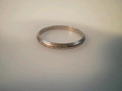 A wedding band stamped platinum