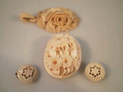 A carved ivorine pendant