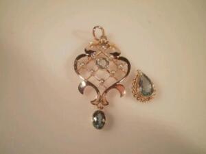 An Edwardian style seed pearl and aquamarine set openwork pendant