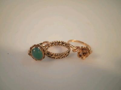 A rose set ring stamped 750