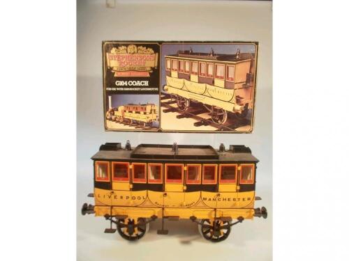 A Hornby Railways Stephenson's Rocket 3?" gauge model of a G104 coach