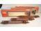 Three Lima 0 scale flat back wagons in boxes