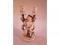 A late 19thC continental porcelain double figural candlestick encrusted