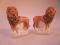 A pair of small 19thC Staffordshire figures of standing lions with a lamb