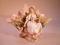 A late 19thC continental porcelain vase in the form of a scalloped shell