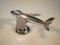 A 1930's Dunhill chrome plated table lighter in the form of a jet aircraft