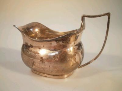 A George V silver cream jug