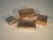 Four silver wood lined cigarette boxes