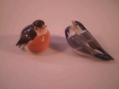 A Royal Copenhagen figure of a Robin together with another of two lovebirds